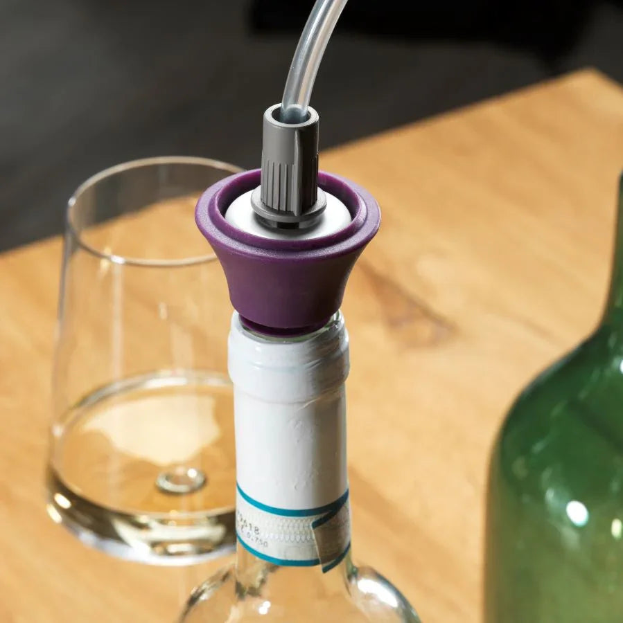 Bouchon pour mise sous vide de bouteilles en verre