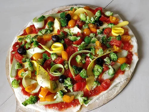 Pizza cuisinée au feu de bois avec nos fours multifonctions Augoust